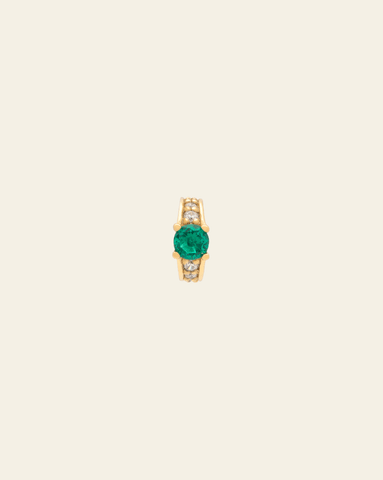 hero image of Emerald Gemstone Spacer on cream background.