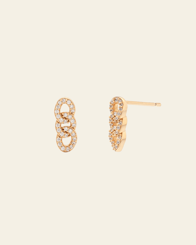 A photo of a pair of pave CZ chain-like stud earrings in Gold Vermeil, against a cream background.